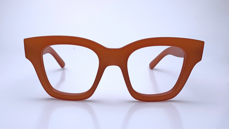 Ariel In Persimmon Crystal:   Modified Cat Eye Frame Fits Medium To Wide Faces