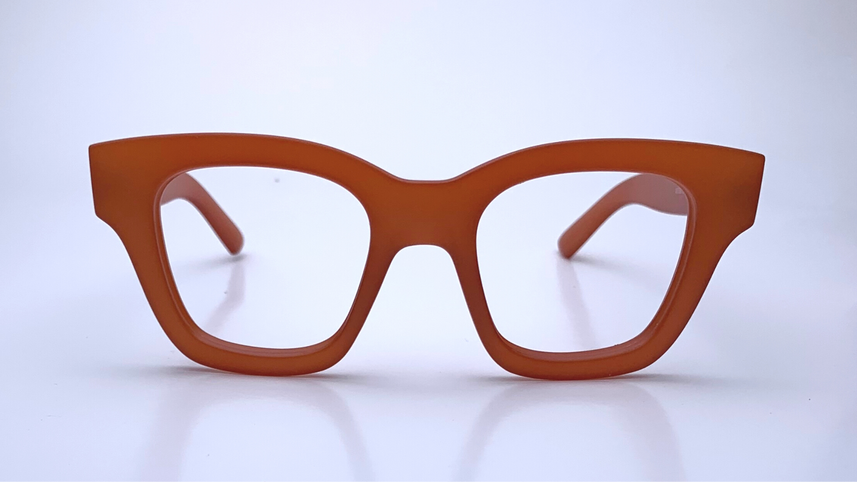 Ariel In Persimmon Crystal:   Modified Cat Eye Frame Fits Medium To Wide Faces